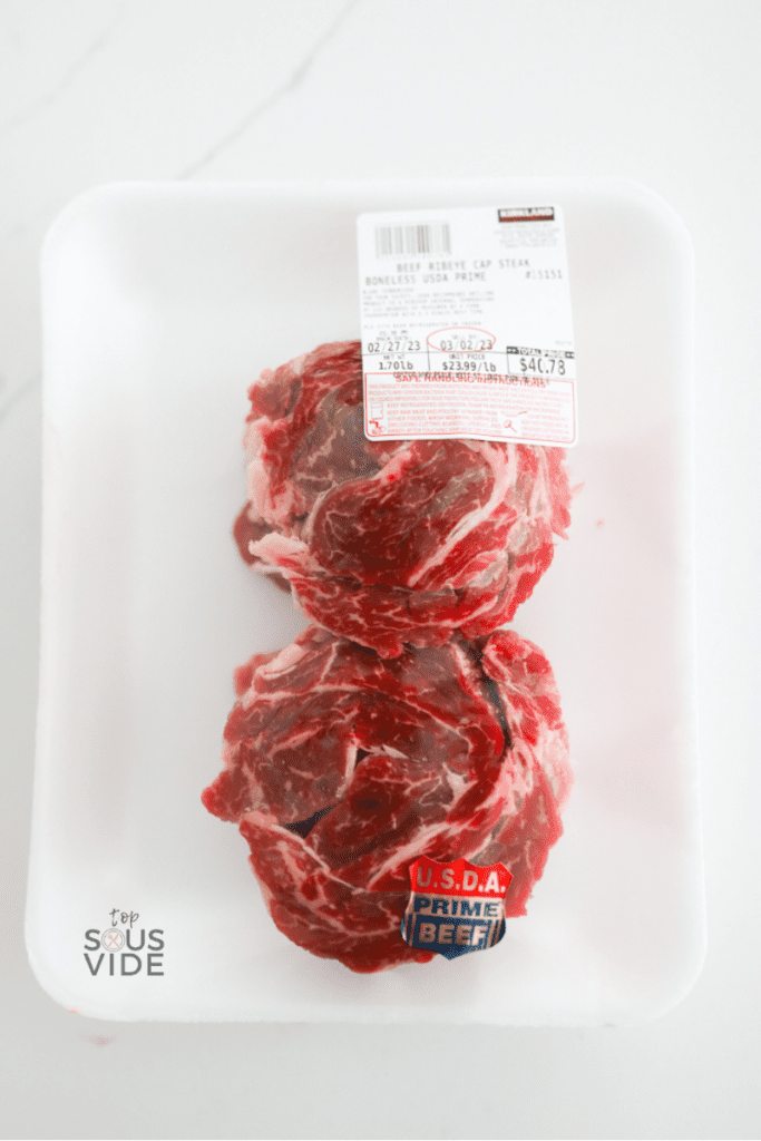 Spinalis steak in Costco packaging. Price is $23.99 per pound.