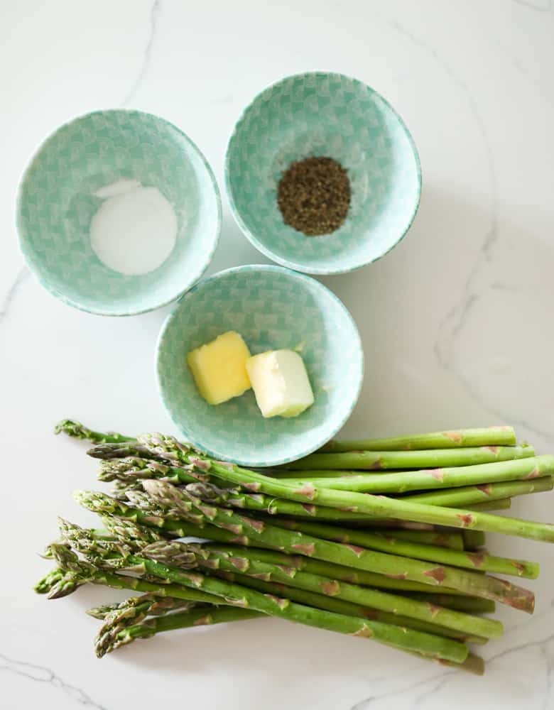 Ingredients - asparagus, butter, salt & pepper. The latter 3 in separate bowls. 