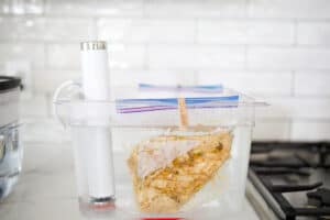 Chicken breast being cooked sous vide.