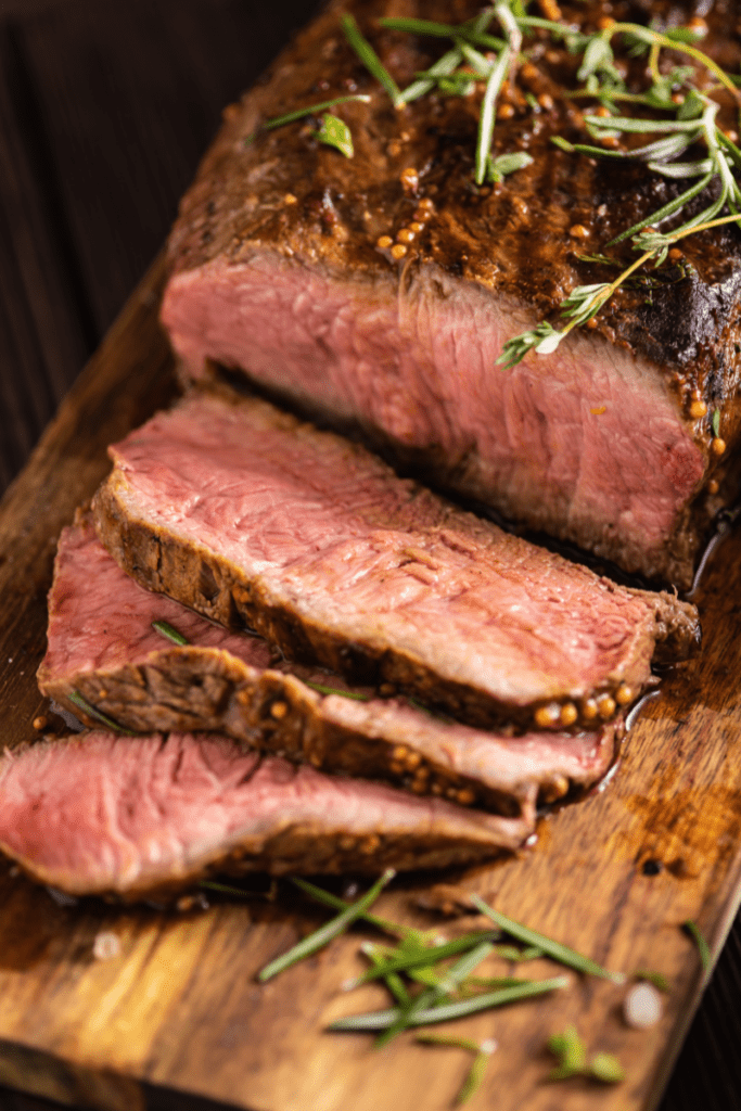 Sous vide roast beef recipe header image. Top round cooked to perfection and sliced.